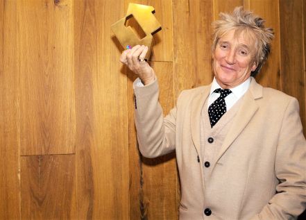 Rod Stewart with his Official Number 1 Album Award from the Official Charts Company for Blood Red Roses (credit: OfficialCharts.com)
