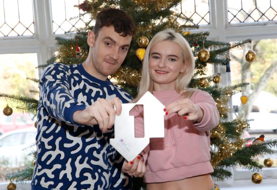 Clean Bandit&rsquo;s Grace Chatto and Jack Patterson celebrating their Christmas Number 1 Award for Rockabye at Grace&rsquo;s parents home, North London. ~ [CREDIT: OfficialCharts.com]