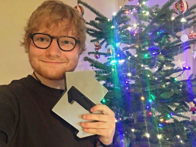 Ed Sheeran celebrating with his Official Christmas Number 1 Award for Perfect [Credit: OfficialCharts.com]