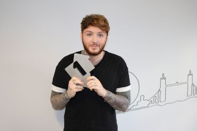 James Arthur pictured with his Official Number 1 Award for his single Say You Won&rsquo;t Let Go. [Credit: OfficialCharts.com]