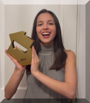 Olivia Rodrigo poses with her Number 1 Album award for you seem pretty sad for a girl so in love (Credit: Official Charts) Olivia Rodrigo poses with her Number 1 Album award for you seem pretty sad for a girl so in love (Credit: Official Charts)