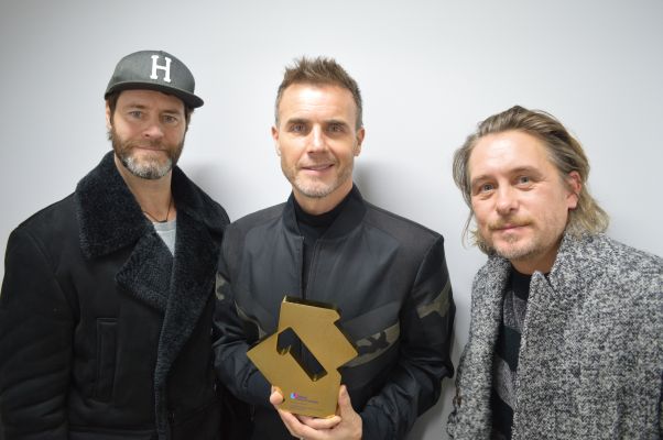 Take That with their Official Number 1 Album Award for Odyssey [Credit officialcharts.com]